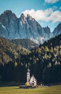 Landscape of mountains with a church