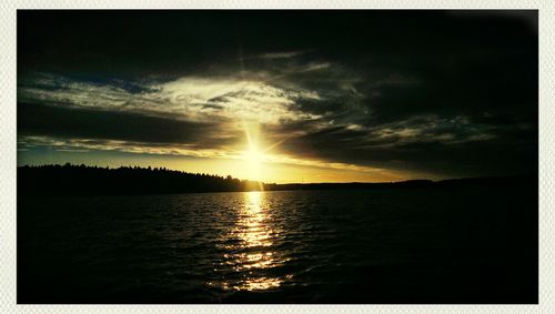 Scenic view of sea at sunset