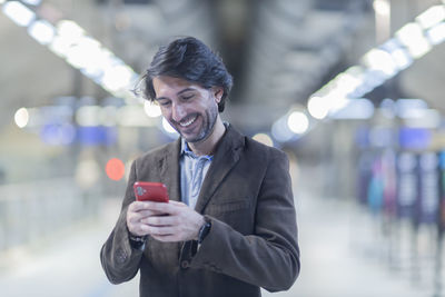 Young man using mobile phone