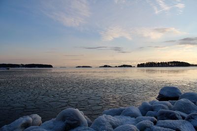 Scenic view of sea at sunset