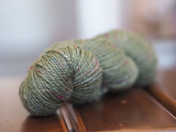 Close-up of wool on table