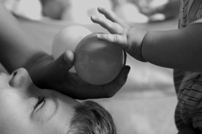 Close-up of woman holding hands