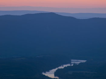 Scenic view of mountains at sunset