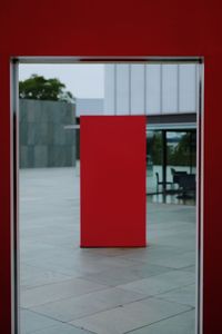 Red glass door of building