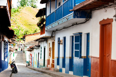 Rear view of woman walking on street