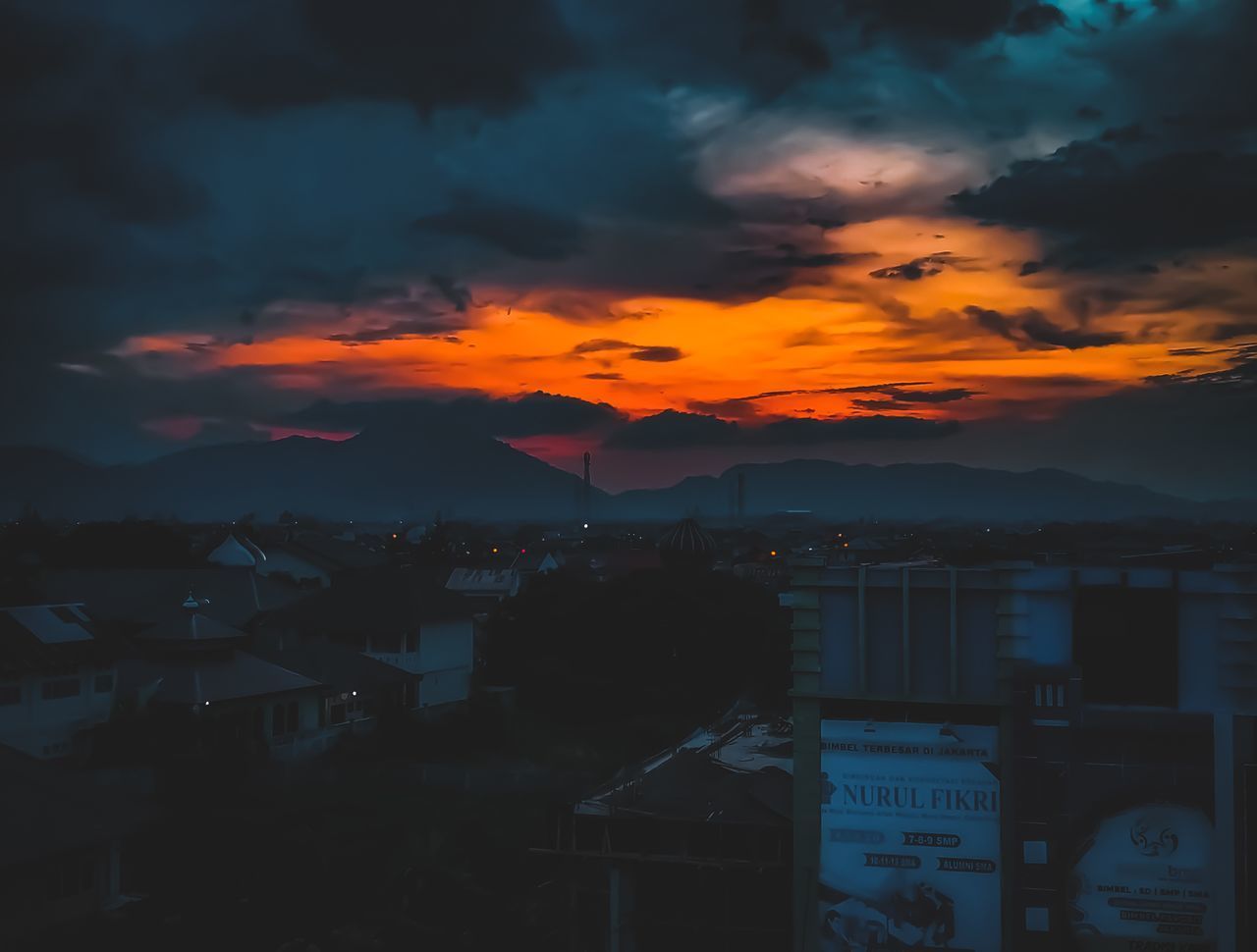 SCENIC VIEW OF ORANGE SKY OVER CITY