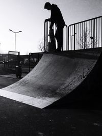 Full length of man skateboarding on skateboard