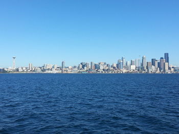 View of cityscape against clear sky