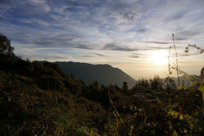 Scenic view of mountains against sky during sunset