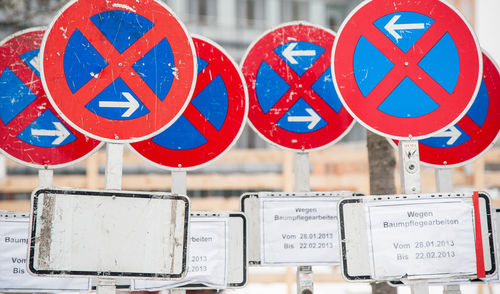 Close-up of warning sign on road