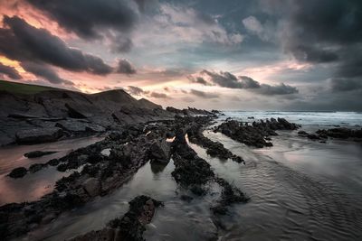 Scenic view of sea against sky during sunset