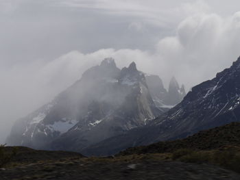 Scenic view of snowcapped mountains against sky