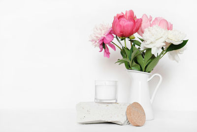 Close-up of white flower vase on table