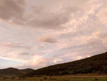 Scenic view of landscape against sky during sunset