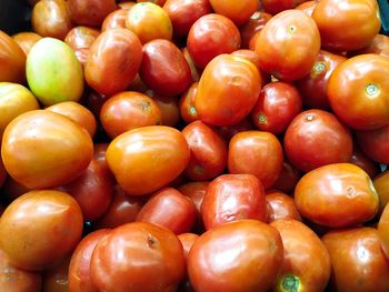 Full frame shot of oranges at market stall