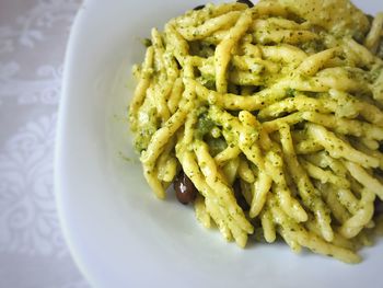 Trofie al pesto with potatoes and cailletier olives