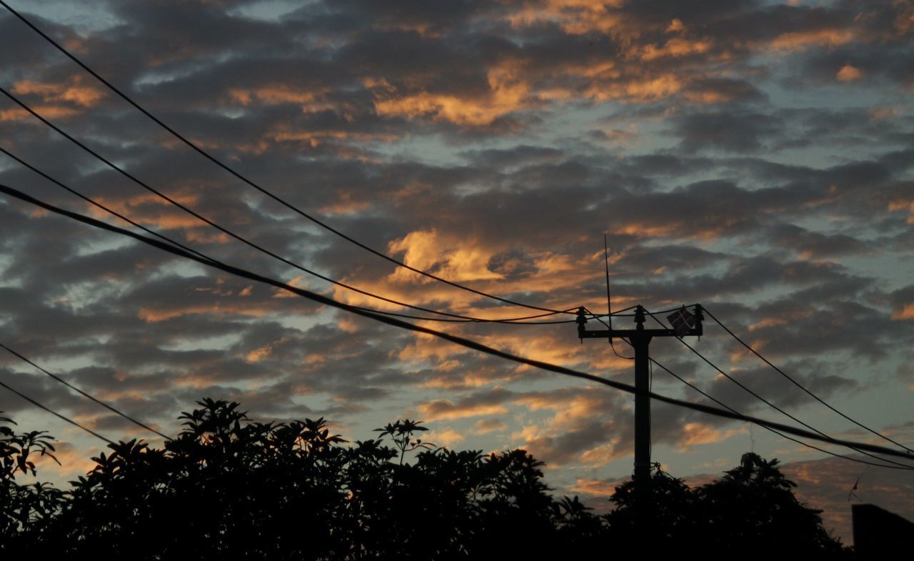 LOW ANGLE VIEW OF SILHOUETTE ELECTRICITY PYLON AGAINST SKY