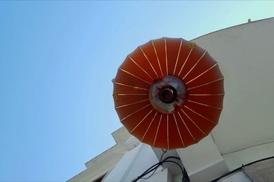 Low angle view of hot air balloon against clear sky