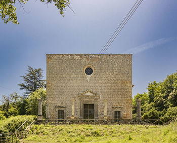 House on field against sky