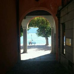 Trees seen through archway