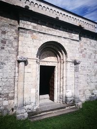 Entrance of historic building against sky