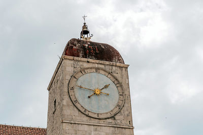 Town hall clock tower in old town of trogir in croatia