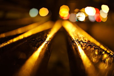 Close-up of illuminated lights at night