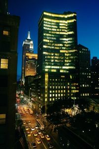 View of city street at dusk