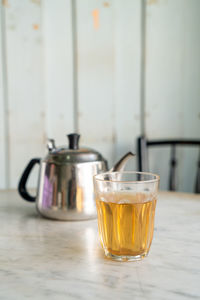 Close-up of tea in glass on table