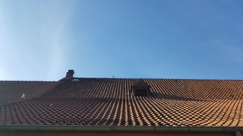 Roof of building against clear sky