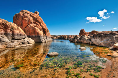 Rock formations against blue sky