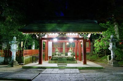 Illuminated entrance of building at night