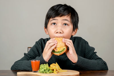 Portrait of man eating food