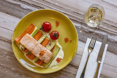 High angle view of fruits in plate on table