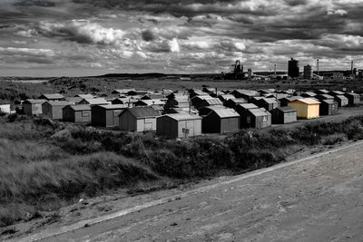 Buildings on beach against sky in city