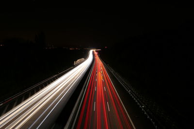 Light trails on road at night