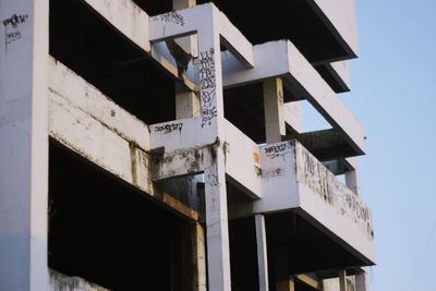 Low angle view of text on building