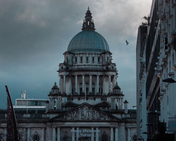 View of buildings in city against sky