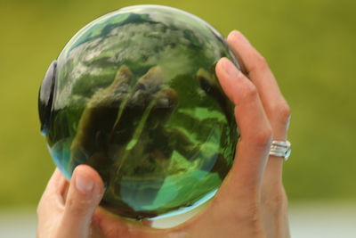 Close-up of hand holding bubble