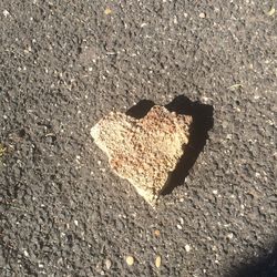 High angle view of heart shape on beach