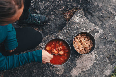 High angle view of woman preparing food