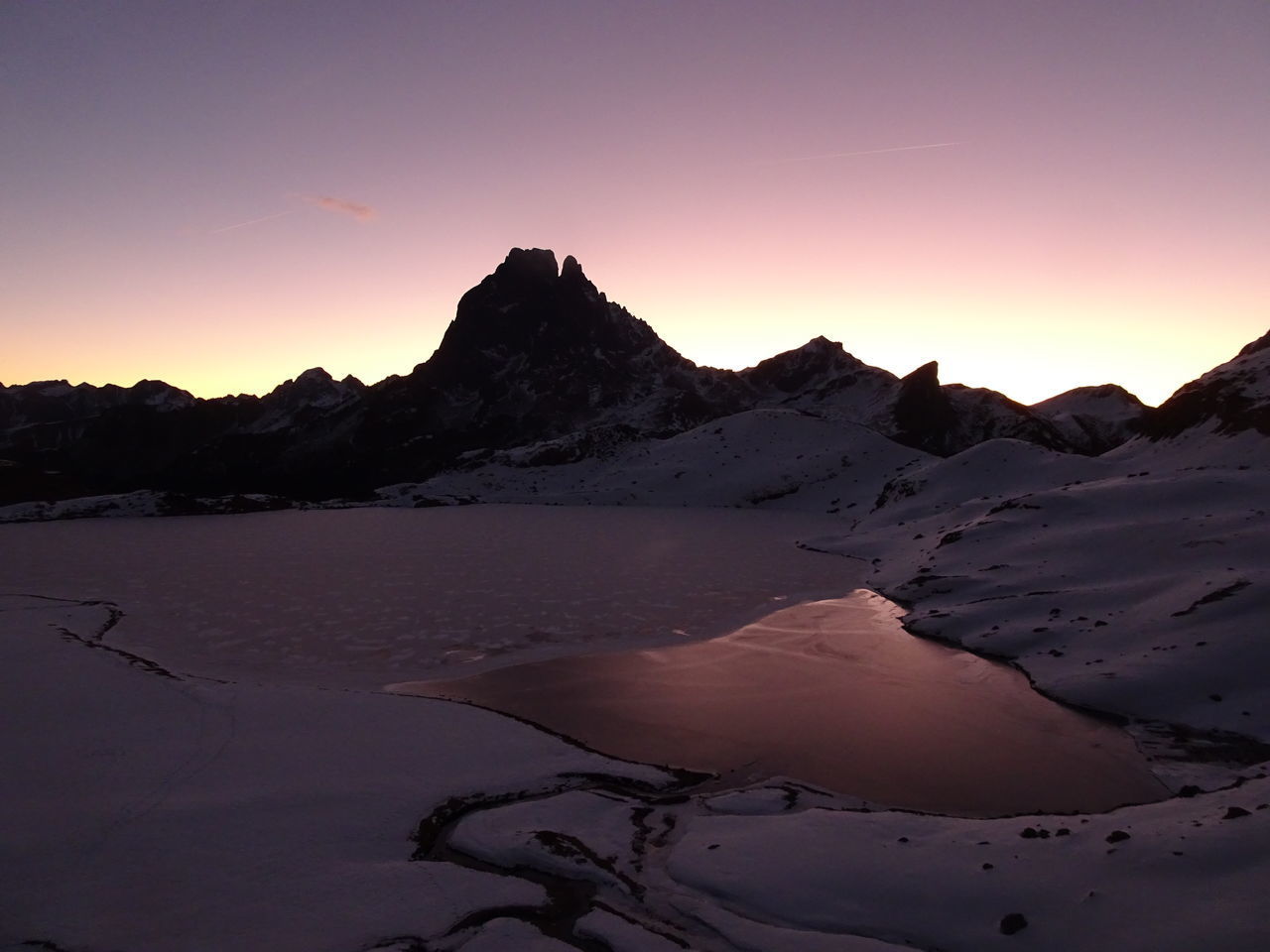 SCENIC VIEW OF MOUNTAINS AGAINST SKY DURING SUNSET