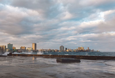 Buildings in city against sky