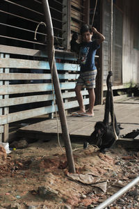 Full length of woman with arms outstretched