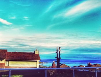 Scenic view of sea against blue sky