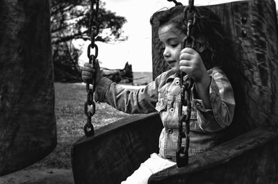 Girl playing on playground