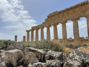 Old ruins of temple against sky