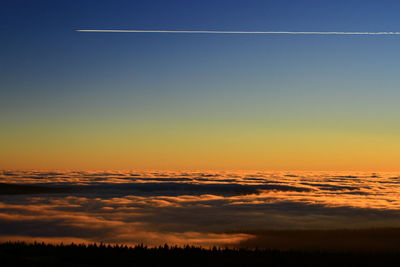 Scenic view of silhouette landscape against sky during sunset