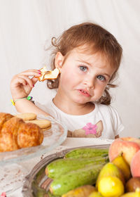 Portrait of boy eating food