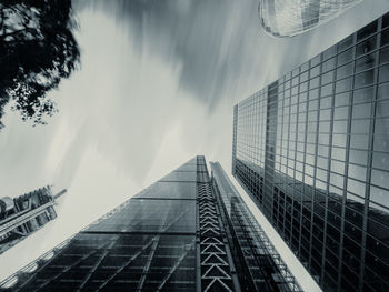 Low angle view of modern buildings against sky